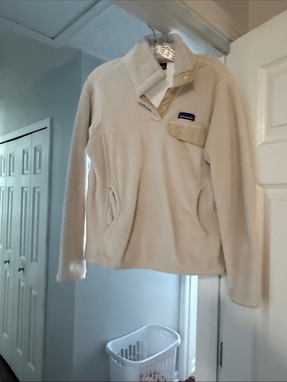 Patagonia Cream Sherpa Pullover with Snap Chest Pocket.